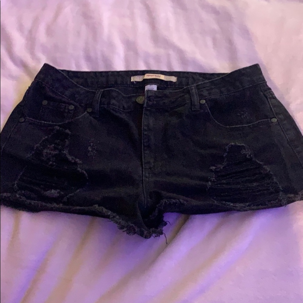 Low rise all black ripped shorts